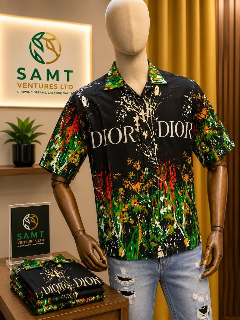 SAMT curated vintage floral camp shirt on mannequin in boutique showroom with forest green and gold brand signage